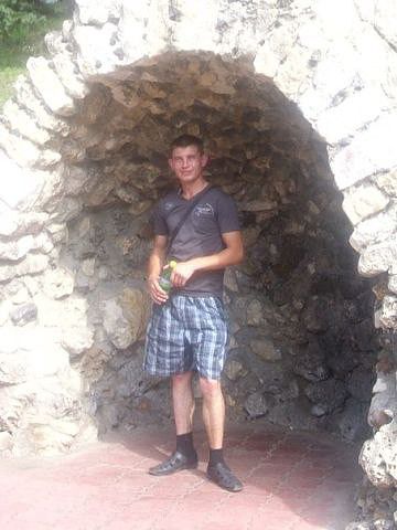 николай